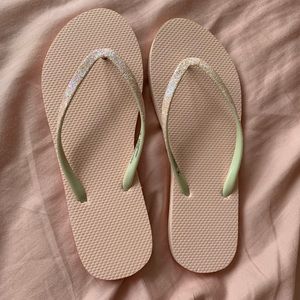 Pink sparkly flip flops